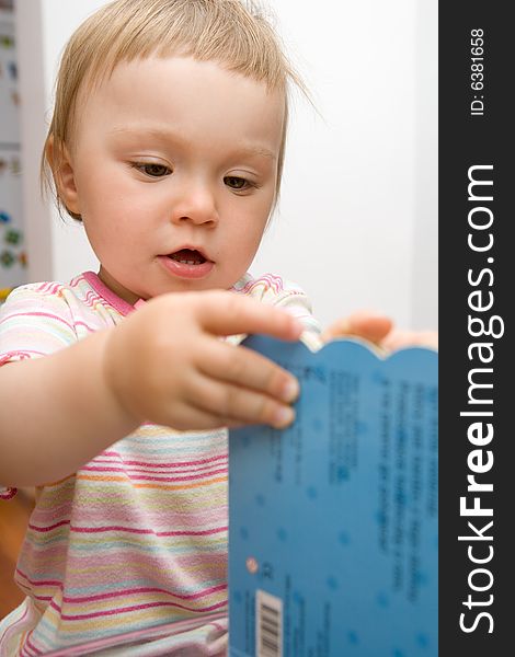 Sweet toddler baby girl reading. Sweet toddler baby girl reading