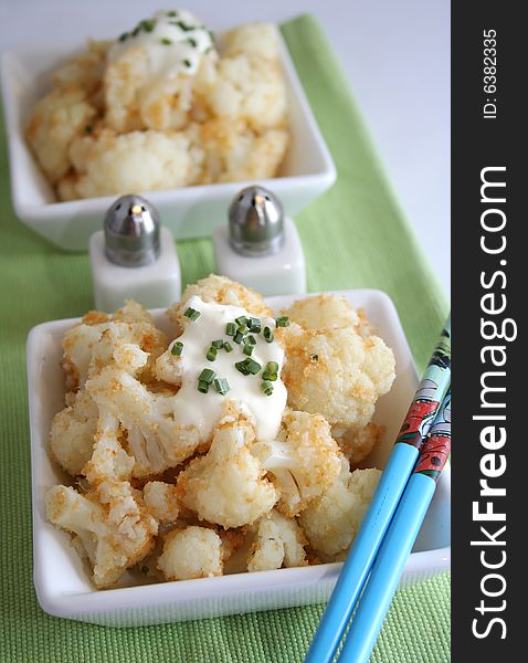 A meal of fresh cauliflower with cream and spices