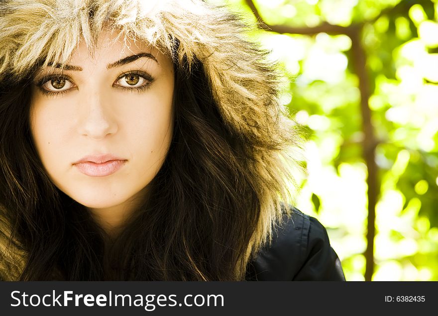 Woman portrait wearing a fur cap.