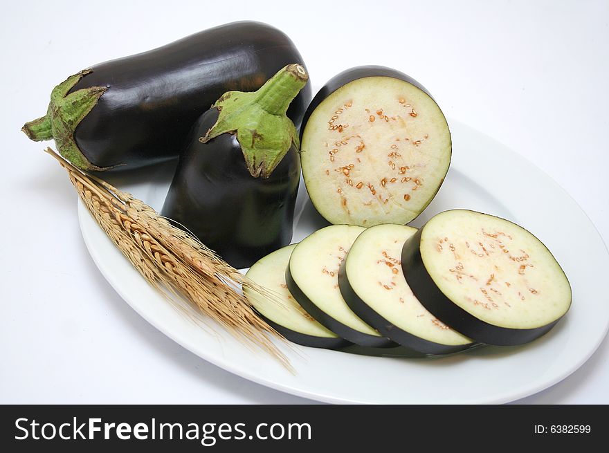 Some pieces of a fresh vegetable aubergine