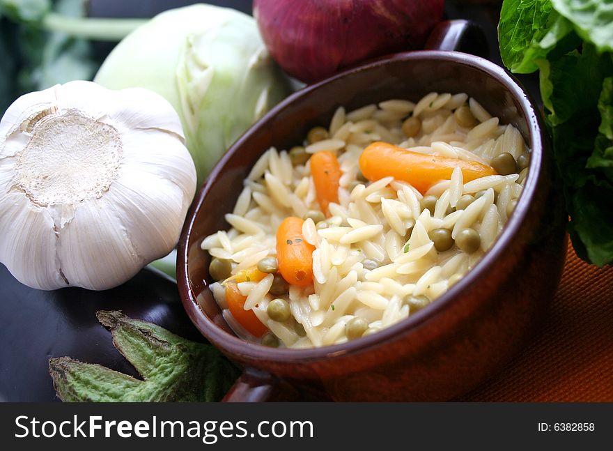 A meal of greg rice noodles with vegetables