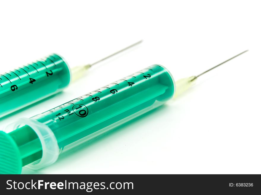 Two syringes - isolated on the white background.