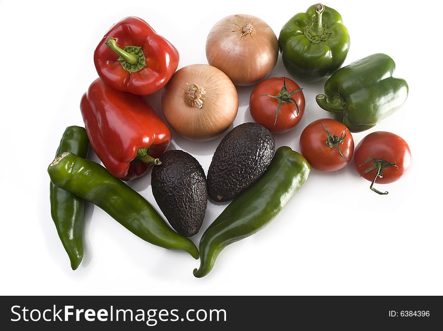 Close up of tomatos, avocados, chile, onion and peppers. Close up of tomatos, avocados, chile, onion and peppers