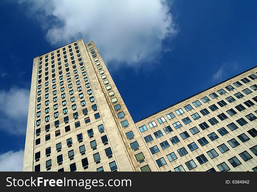 Modern skyscraper building with sky background. Modern skyscraper building with sky background