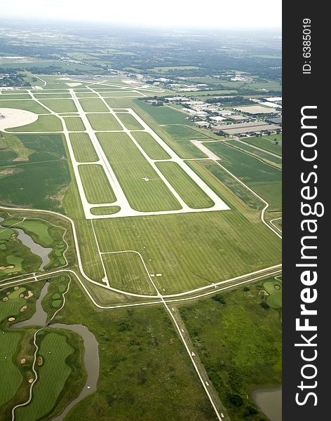Landscape photo from above of an airport. Landscape photo from above of an airport.