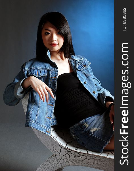 Pretty asian girl image at the studio background