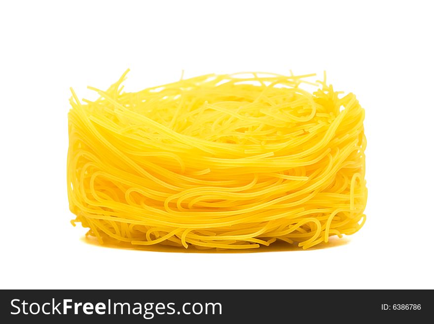 Yellow beautiful pasta on a white background