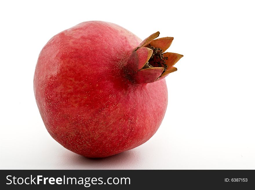 Whole  pomegranate isolated on white