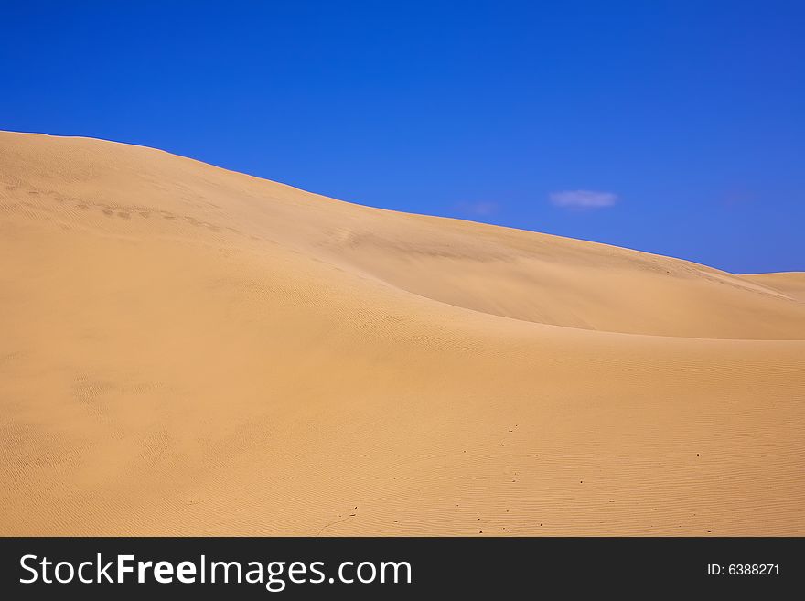 Sand Dune with Wind Textures in the Desert in Morocco. Sand Dune with Wind Textures in the Desert in Morocco