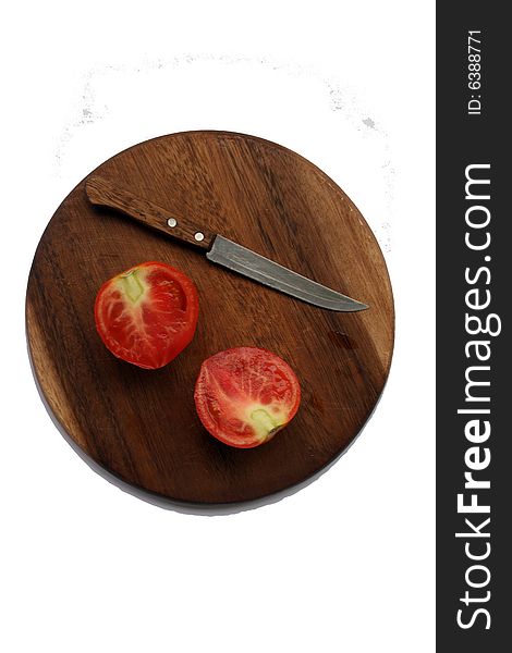 Tomato with knife