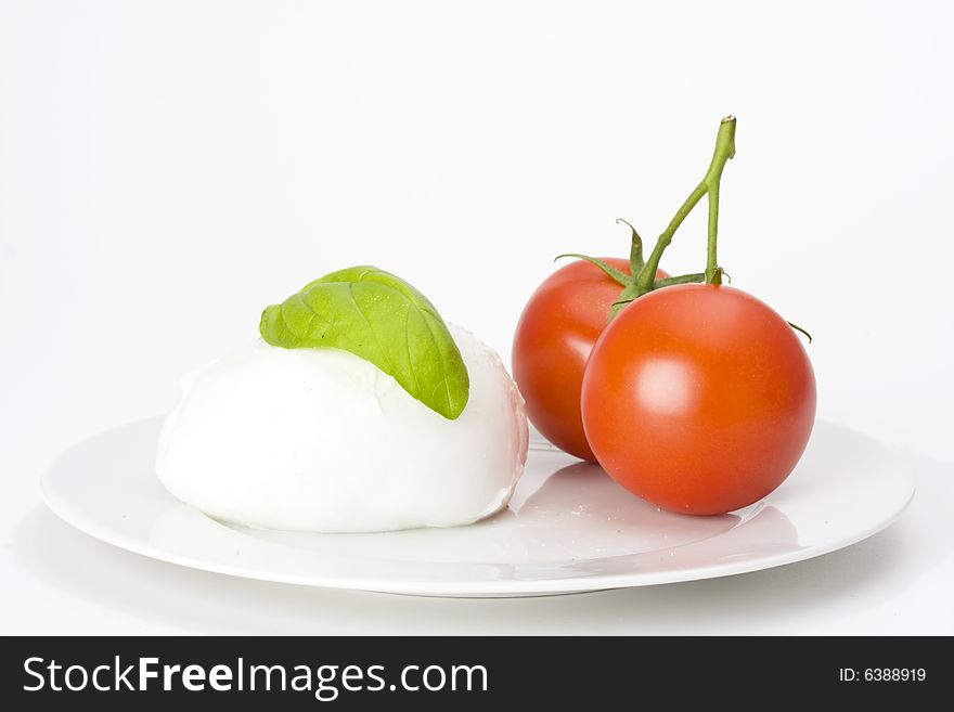 Caprese salad: tomato, mozzarella, basil