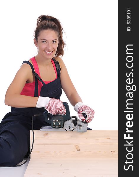 Woman carpenter at work on white background
