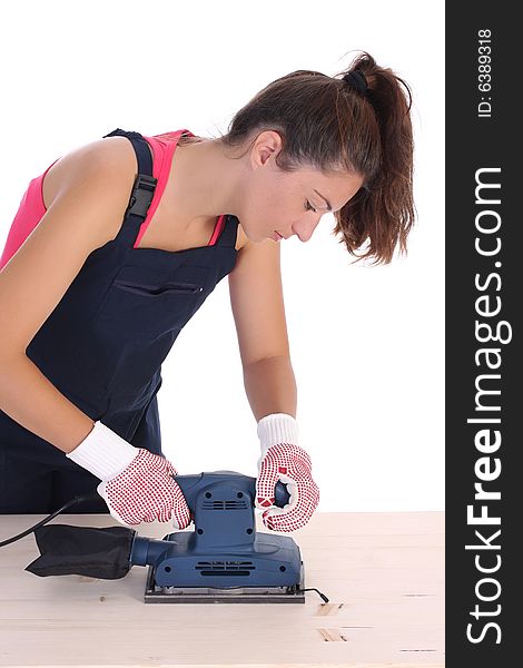 Woman carpenter at work on white background