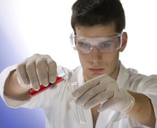 Young Scientist Working With Mask Stock Photo