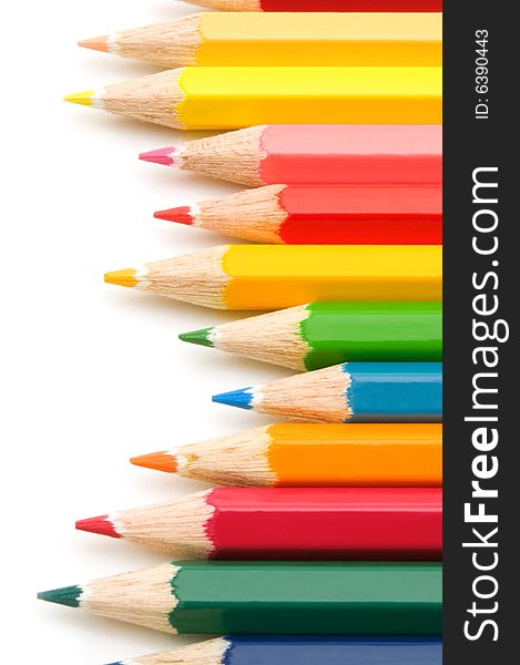 Colorful pencils on white background