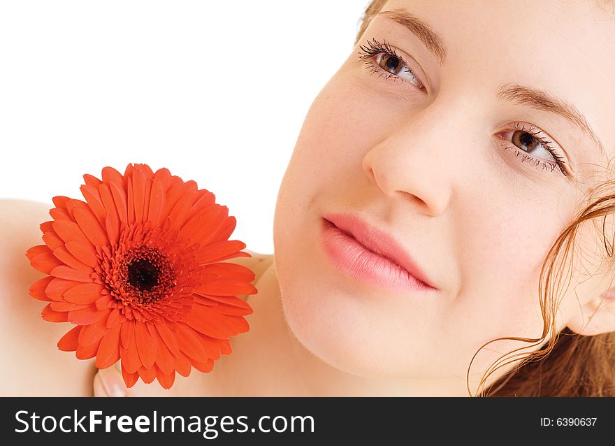 Young pretty woman holding a red flower. Young pretty woman holding a red flower