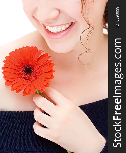 Pretty young woman holding a red flower. Pretty young woman holding a red flower