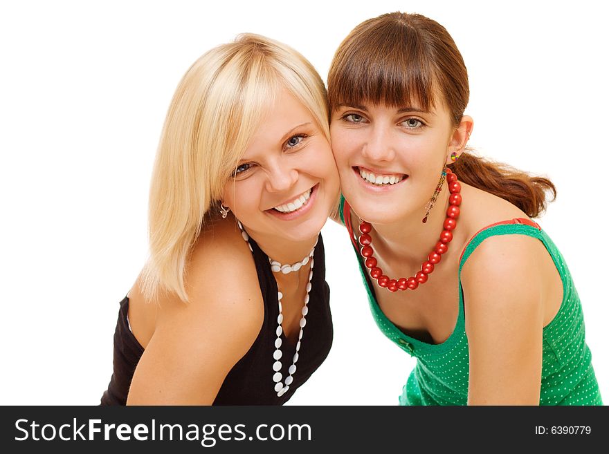 Two smiling pretty girls on white background. Two smiling pretty girls on white background