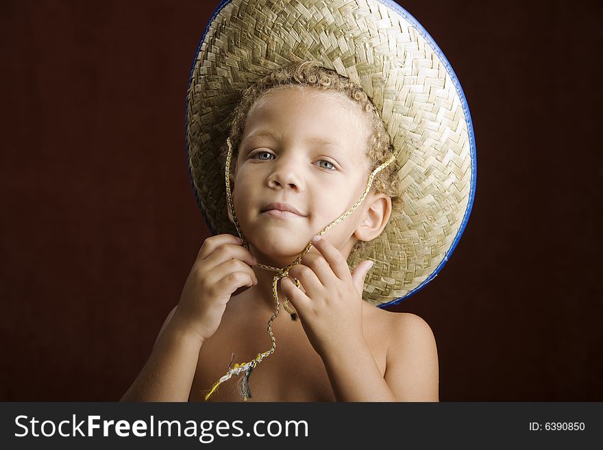 Little Boy In A Straw Hat