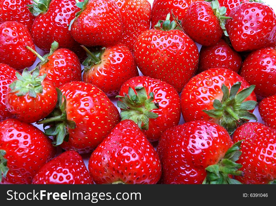 Background of fresh juicy strawberries. Background of fresh juicy strawberries