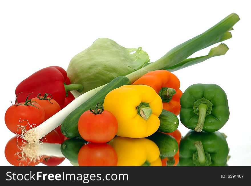 Fresh vegetables on glass and white background