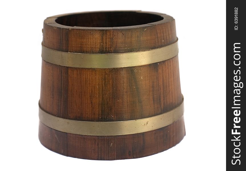 An old wood bucket with brass in silo