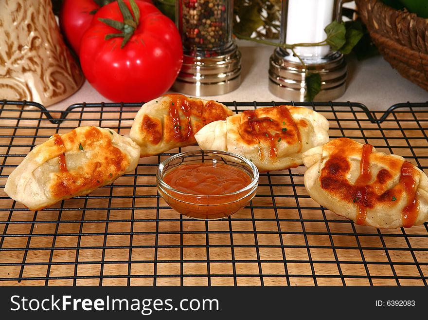 Asian dumplings and peanut dipping sauce.