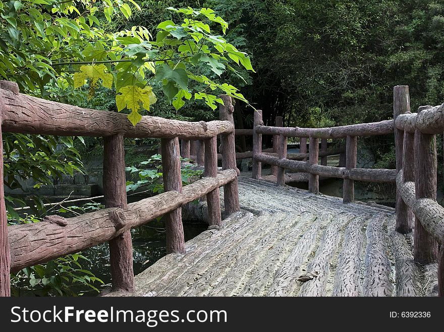 The wooden bridge in a park of china