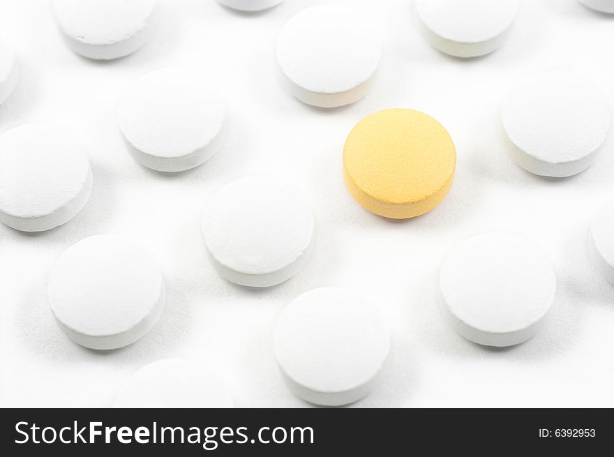 Colourful pills and drugs isolated on white