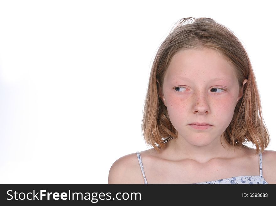 Girl With Freckles Looking Off To The Side