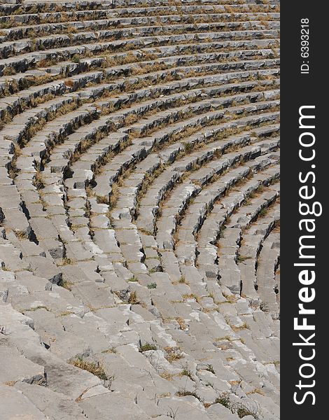 Close up of rows of seats and stairway, ancient open amphitheatre. Turkey. Close up of rows of seats and stairway, ancient open amphitheatre. Turkey.