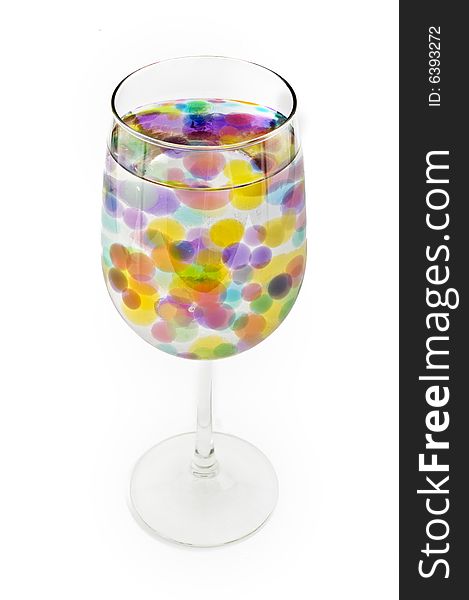 Colored bubbles in a wine glass. Colored bubbles in a wine glass