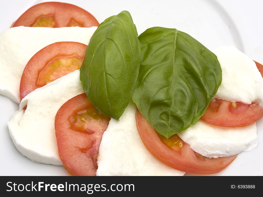 Caprese salad: tomato, mozzarella, basil