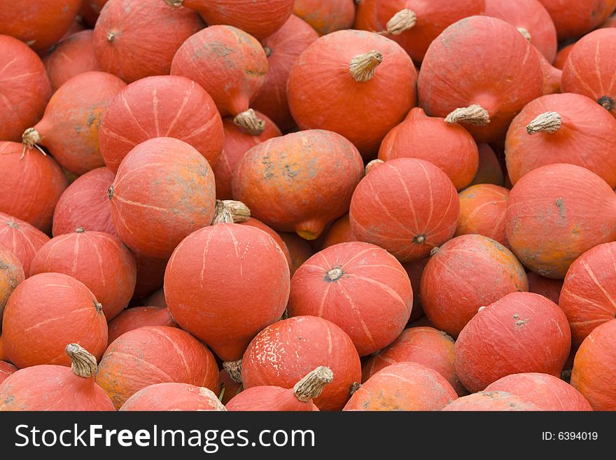 Lots of pumpkins piled up