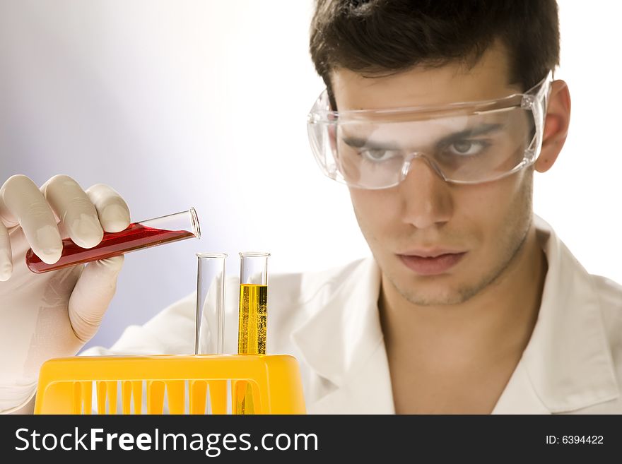 Young scientist working in his laboratory