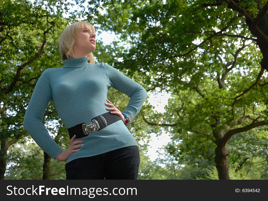 Beautiful blond young lady portrait in woods. Beautiful blond young lady portrait in woods