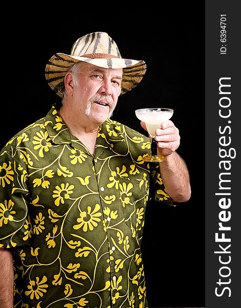 Older man giving a toast with a frozen drink. Older man giving a toast with a frozen drink.