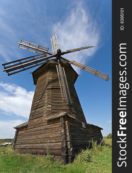 Old wooden windmill in russian open-air museum