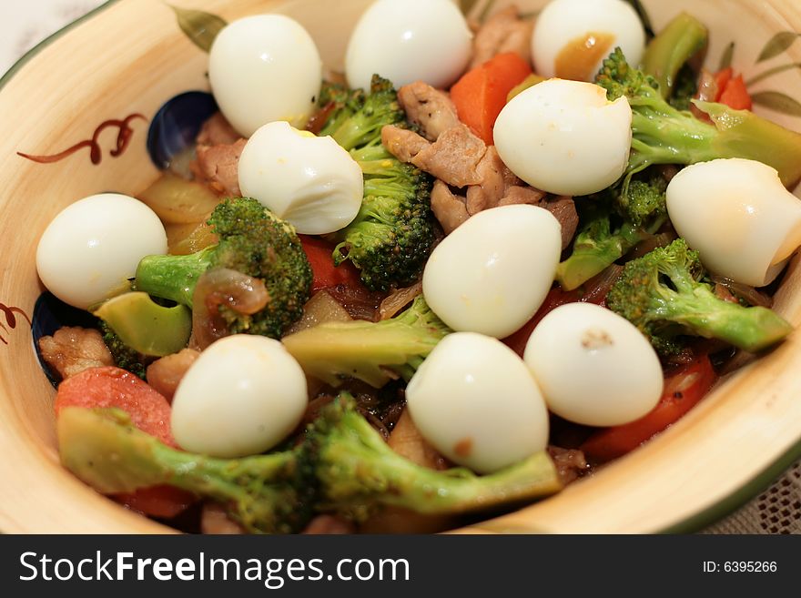 Closeup of broccoli vegetables with quail eggs. Closeup of broccoli vegetables with quail eggs