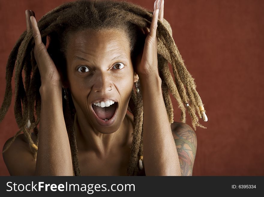 Shocked African American Woman with Hair in Dreadlocks