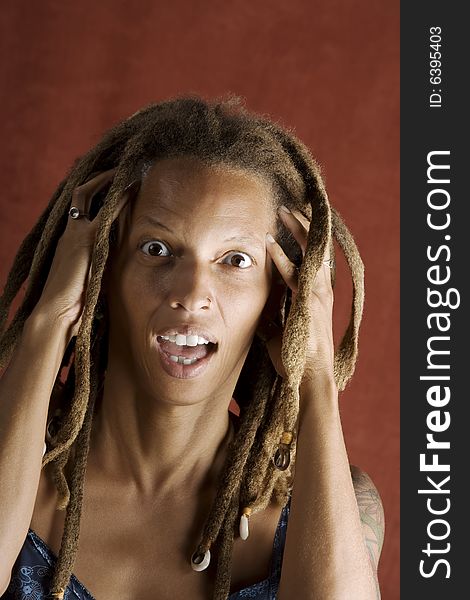 Shocked African American Woman with Hair in Dreadlocks