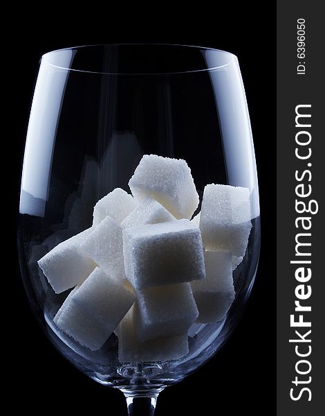 Sugar cubes in a wine glass