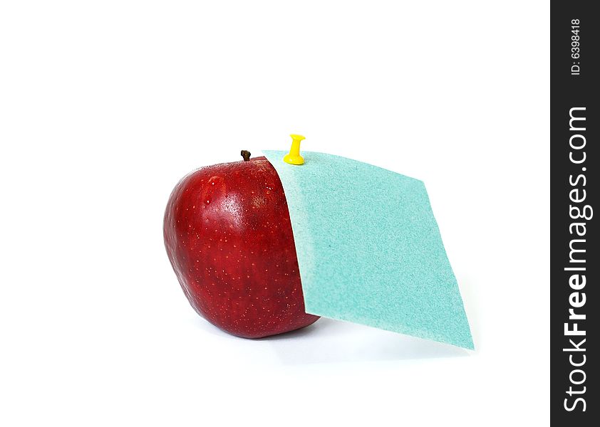 Red apple and note paper isolated on white background