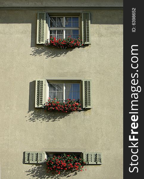 Windows with flowers in Lucerne/Luzern city (Switzerland). Windows with flowers in Lucerne/Luzern city (Switzerland)