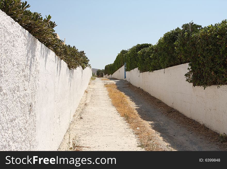 A narrow street on the island of Crete in Greece