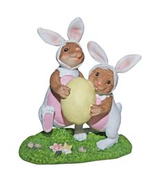 Easter Bunnies Carrying Egg - With Path Stock Photos Easter Bunnies Carrying Egg - With Path Stock Photos