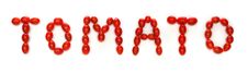 Word TOMATO Written With Cherry Tomatoes Stock Image