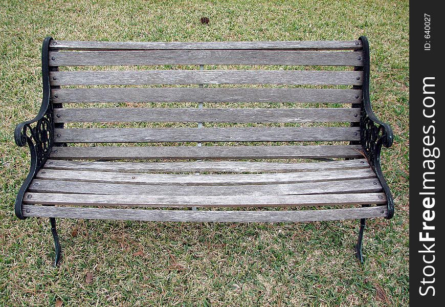 Garden chair in the middle of grass