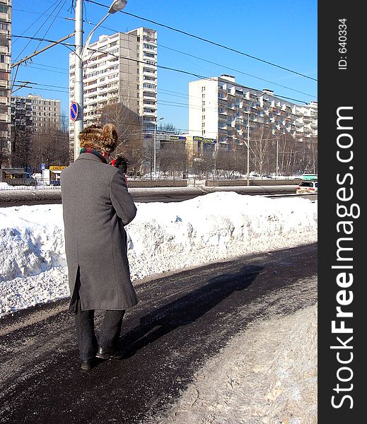 Man Walking With A Dog