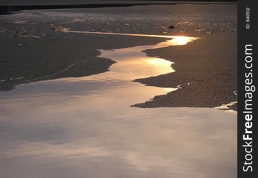 Ice breaking on the lake in the spring sunny evening. Ice breaking on the lake in the spring sunny evening